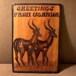 “Greetings from Uganda” sign